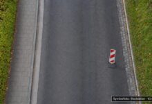 KI-generiertes Symbolfoto zu Verkehrsunfallflucht bei Memmingen, Römerstraße